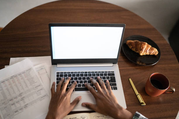 istock Hands of a man tipying on the laptop 1336549554