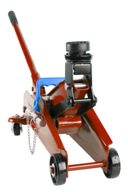 istock red hydraulic car jack isolated on white background, rised up 1336549956