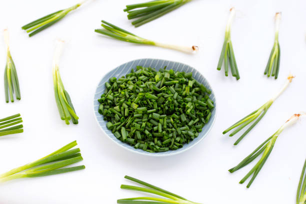 istock chopped spring onions on white background 1336550946