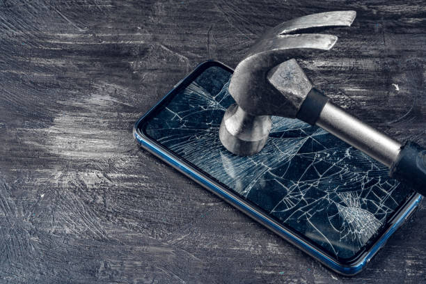 istock Digital gadget with tools. Repairing smartphone concept 1336553173