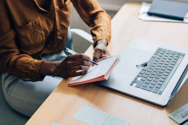 istock An Anonymous Business Woman Working at Home 1336556420