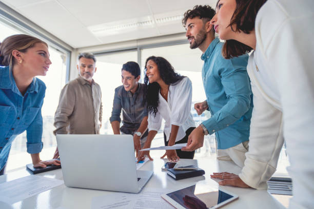 istock Team of business people working together. 1336558375