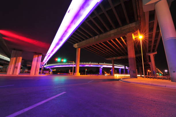 istock Bridge, the city at night 1336560836