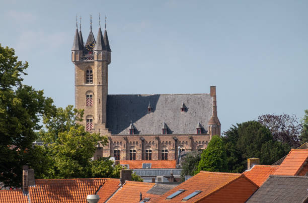 istock The Belfry over red roofs in Sluis, The Netherlands 1336564826