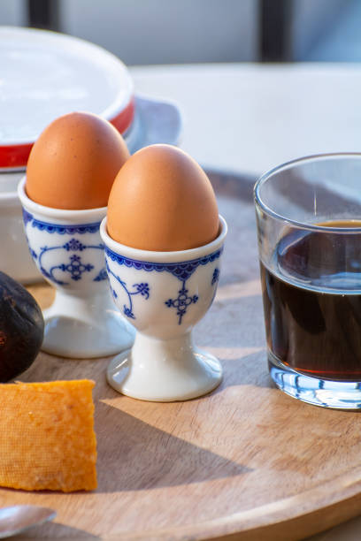 istock Continental breakfast with soft-boiled chicken egg served outdoor 1336564962