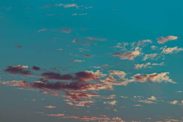 istock Capri blue sky with white clouds with the illumination of its surface alternating between shadows and light. 1336567299