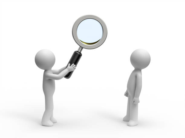istock 3d people searching with a magnifying glass. 1336569226