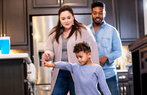 istock Multi-ethnic family, boy pointing at something he wants 1336579725