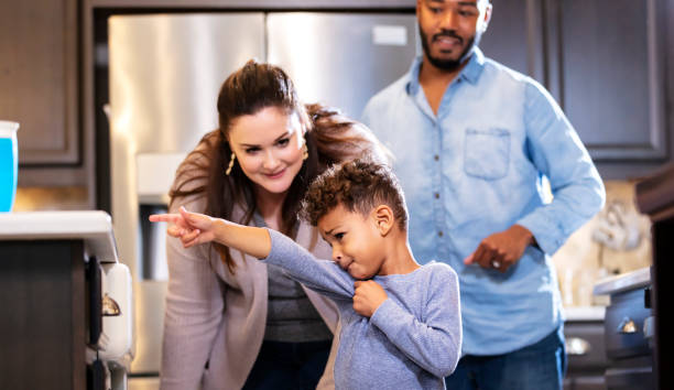 istock Multi-ethnic family, boy pointing at something he wants 1336579733