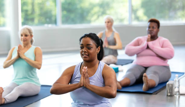 istock Four multi-ethnic women in yoga class 1336584985