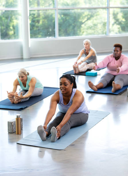 istock Four multi-ethnic women taking yoga class 1336584996
