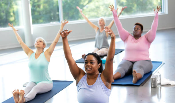 istock Four multi-ethnic women in yoga class 1336585507