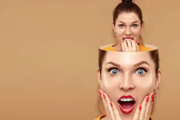 In the head of the surprised girl sits a brain that is afraid, gnaws at her nails. The concept of psychological health, fear of mistakes, memory, problems, failure to complete tasks