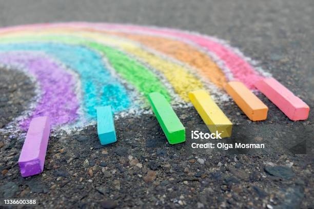 Chalk Drawing Rainbow Colors On The Asphalt Children Outdoors Stock Photo - Download Image Now