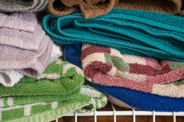 istock Clean towels arranged in home laundry room 1336601346