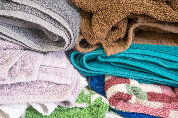 istock Clean towels arranged in home laundry room 1336601352