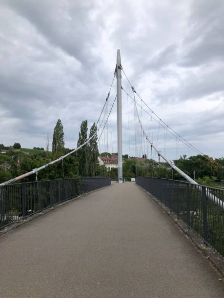istock Modern pedestrian bridge at a traffic junction 1336608651