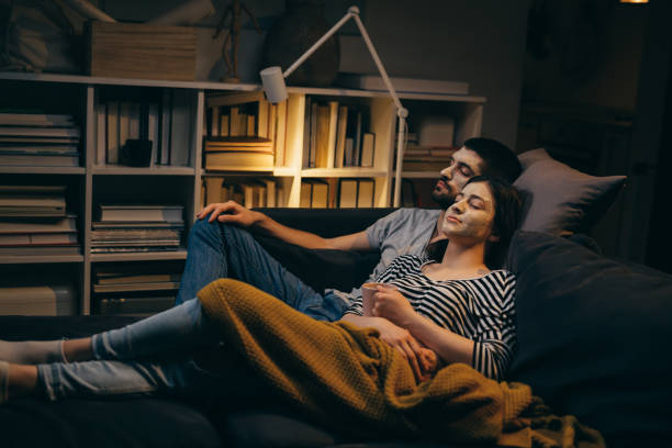 istock young couple spending evening together at home 1336609062