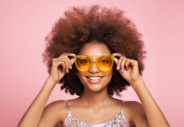 Beauty portrait of African American girl in sunglasses stock photo