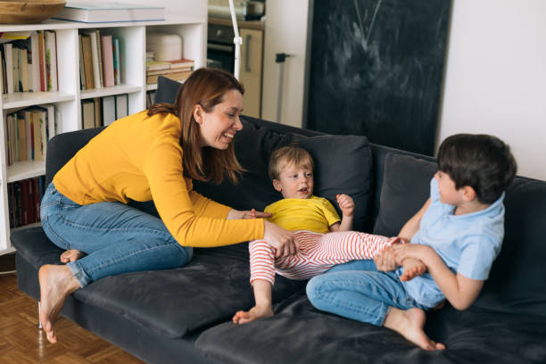 istock mother and kids at home 1336610908