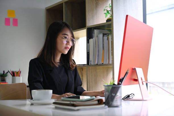 istock Successful businesswoman working with modern device at her workplace. 1336612022