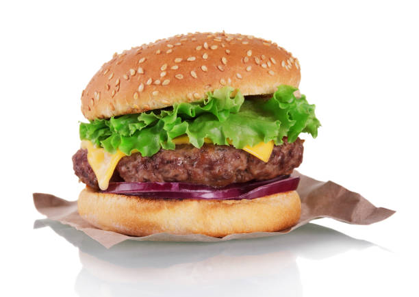 istock Fresh juicy burger with big cutlet and vegetables isolated on white 1336618556