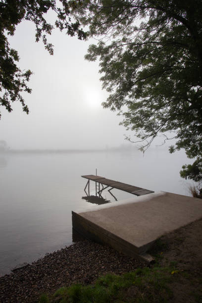 istock Jetty in the misty riveer Meus 1336618613