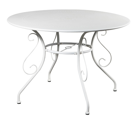 White cast iron round table on white background。