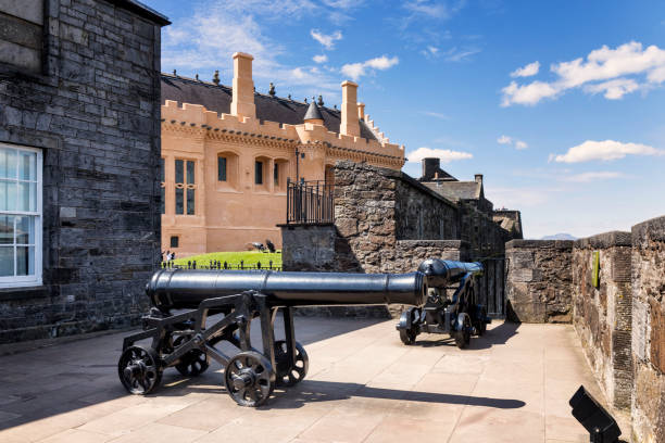 Stirling, United Kingdom - May 12, 2019:Cannons on Stirling Castle battlements at the part of the Outer Defences known as the French Spur. It fired cannonballs about 10cm in diameter weighing approximately 3kg.