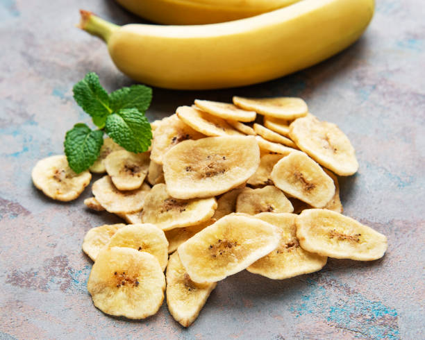 istock Dried candied banana slices or chips 1336624456