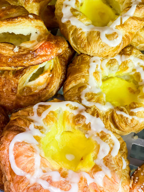 istock Danish pastry, puff pastry with icing and custard. 1336627595