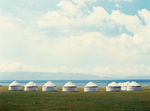 Scenic view of ten yurts near Son-Kul lake in Kyrgyzstan in summer