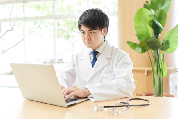 istock Male doctor suffering from hoax information 1336633085