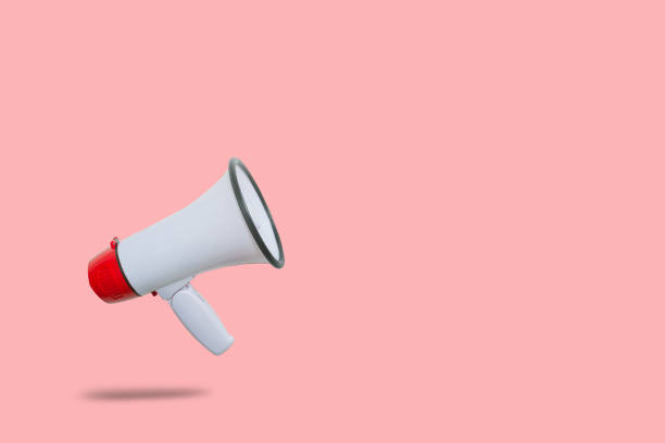 istock Red megaphone floating on floor for announcement and advertisement. 1336634499