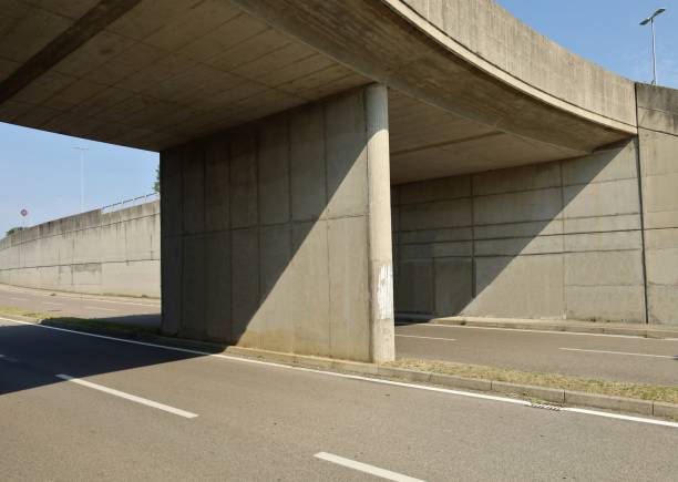 istock Large concrete road underpass  with a four lane street under it. 1336634732