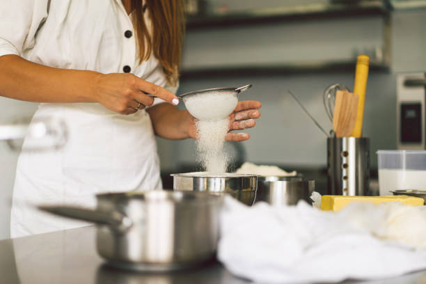 istock Hands working with dough preparation recipe bread, pizza or pie making ingridients. Butter, milk, eggs, sugar the concept of homemade pastry, cooking cakes 1336634965