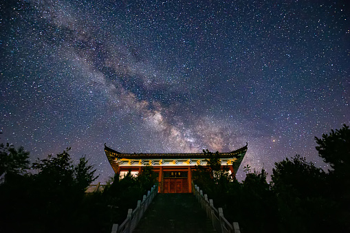 Milky Way with temple on mountain