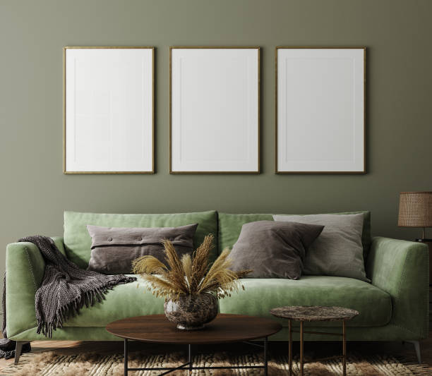istock Poster mockup in home interior with green sofa, table and decor 1336639555