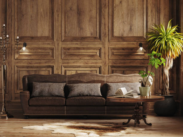 istock Dark cozy interior with wooden panel wall, brown sofa and flowers 1336639584