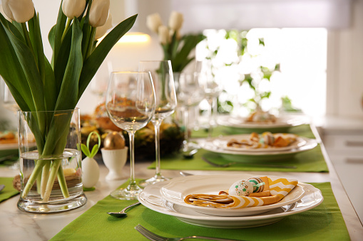 Festive Easter table setting with floral decor