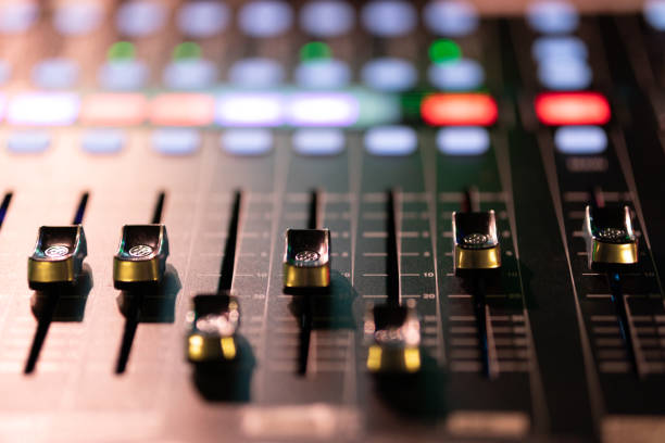 slider controls of modern digital audio mixer - human finger sound mixer music producer imagens e fotografias de stock
