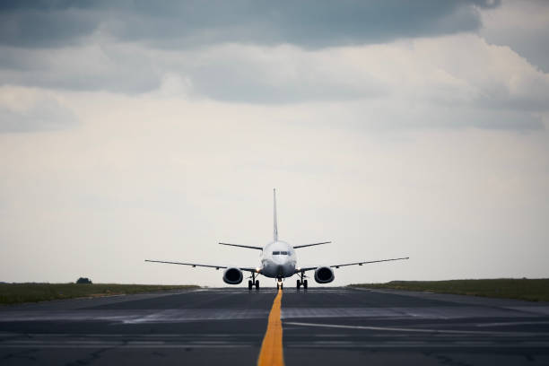 istock Front view of airplane at airport 1336641481