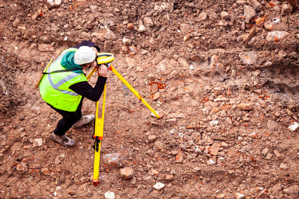 istock A surveyor on a construction site uses an optical level 1336644799