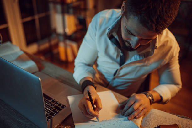 istock Male author writing a new novel 1336646877