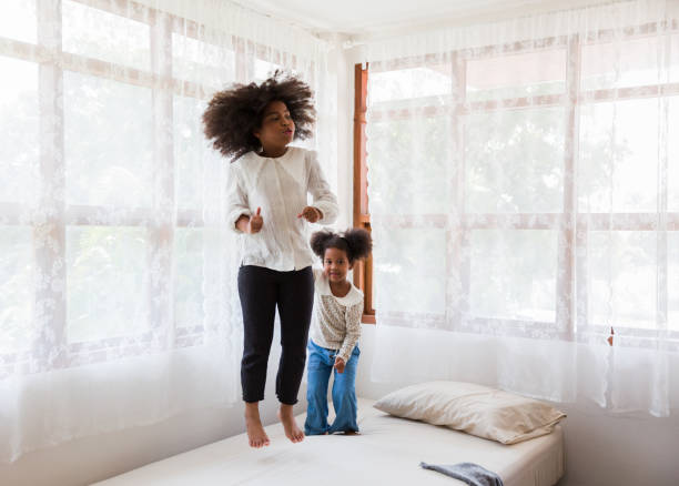 istock Children relaxing tegother on the bed. 1336646934