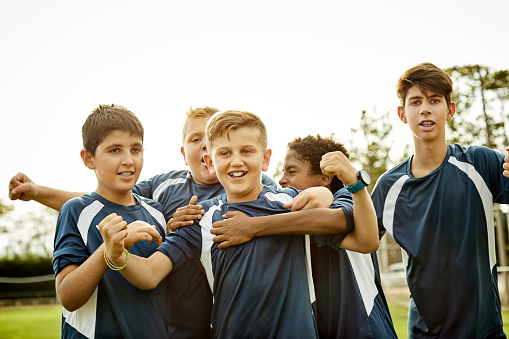 Happy Teenage Boys Cheering In Soccer Field Stock Photo - Download ...