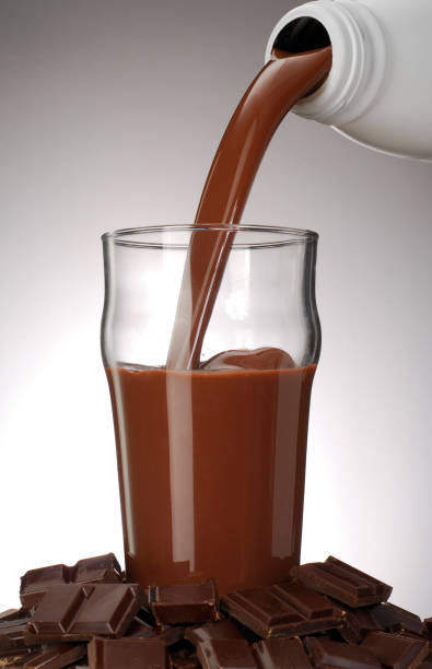 istock Pouring milky chocolate cream on glass 1336647355