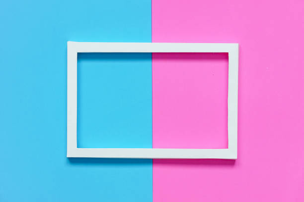 istock white paper frame on pink paper and blue paper 1336654008