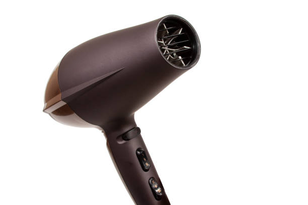 istock Brown hair dryer isolated on the white 1336657177