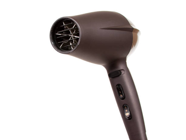 istock Brown hair dryer isolated on the white 1336657313